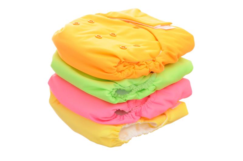Cloth Diaper Guide: Stack of Colourful Cloth Diapers