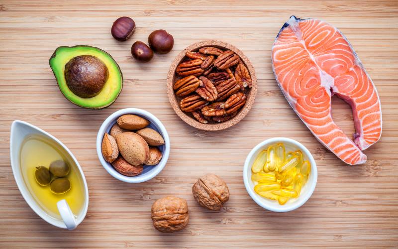 Foods high in omega 3s, such as avocado, salmon, nuts, olive oil.