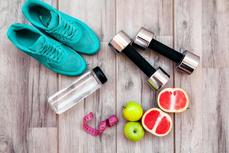 How to fit exercise into a busy schedule: Workout gear on floor