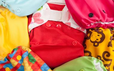 Cloth Diaper Buying 101: assortment of colourful cloth diaper covers