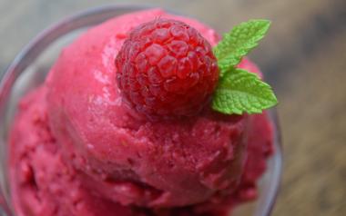 fruit ice cream with a raspberry on top