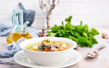 soup with vegetables and mushrooms and fresh greens