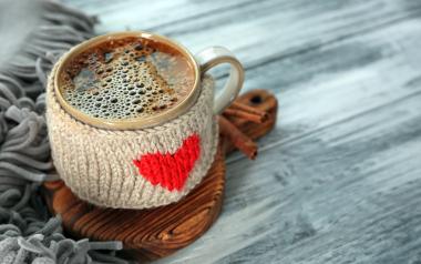 Mug of coffee with a knit cozy