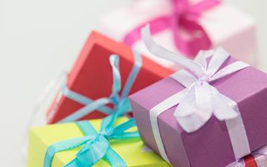 colourful gifts boxes wrapped with ribbons