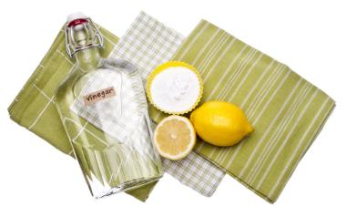Healthy Homemade Cleaning Products: image of dishcloths, lemon, vinegar, baking soda