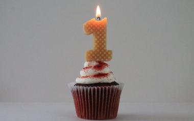 cupcake with a number one candle