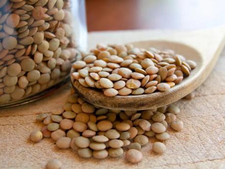lentils on a spoon and in a jug
