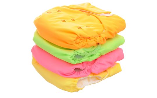 Cloth Diaper Guide: Stack of Colourful Cloth Diapers