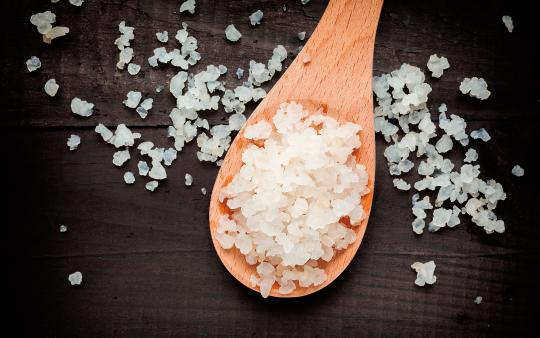 kefir grains on a wooden spoon