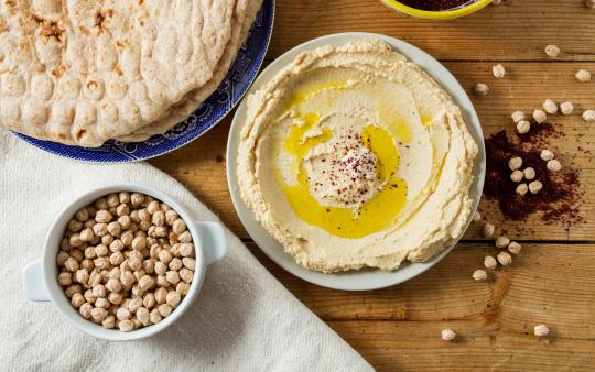 bowl of hummus and bowl of chick peas