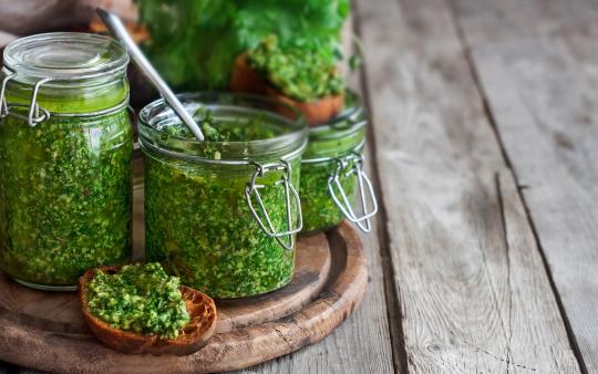 pesto sauce in three jars