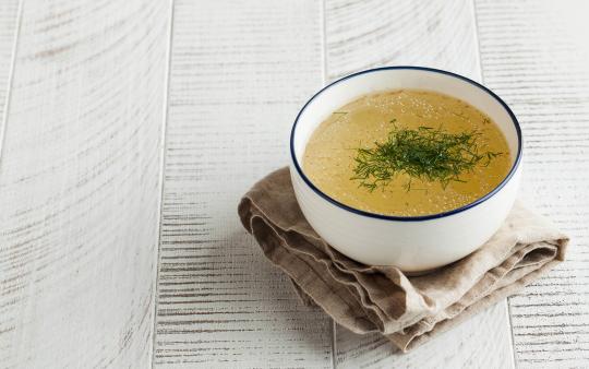 bowl of soup on a cloth napkin