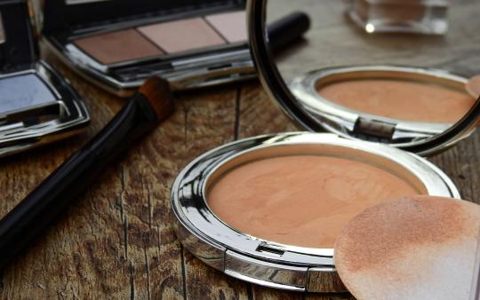 pressed powder cosmetics on a table