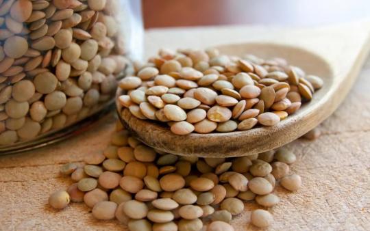 lentils on a spoon and in a jug