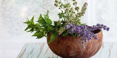 Herb spiral: Herbs in a wooden pot